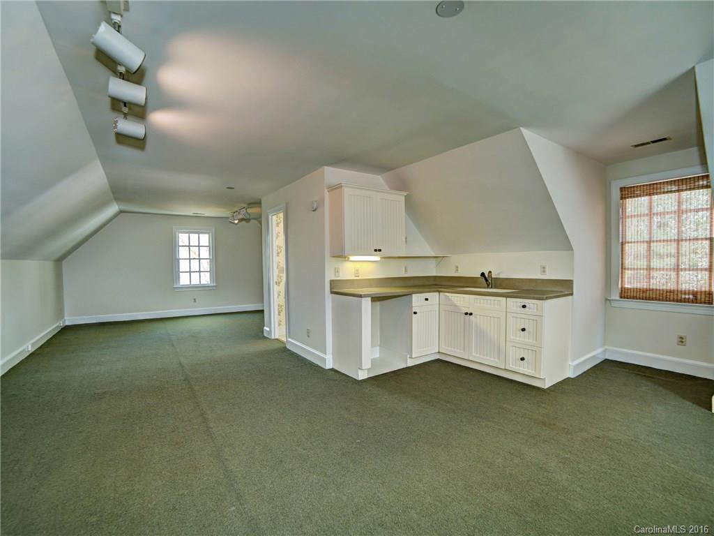 2101 Scotland Ridge Road Charlotte, NC 28211 - Photo 23 of 24 a view of an empty room with a window