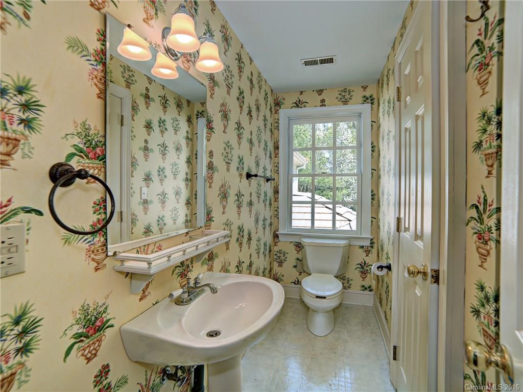 2101 Scotland Ridge Road Charlotte, NC 28211 - Photo 24 of 24 a bathroom with a sink toilet and shower