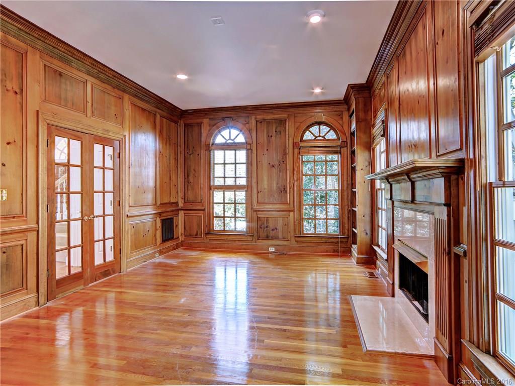 2101 Scotland Ridge Road Charlotte, NC 28211 - Photo 6 of 24 a view of an empty room with wooden floor and a window