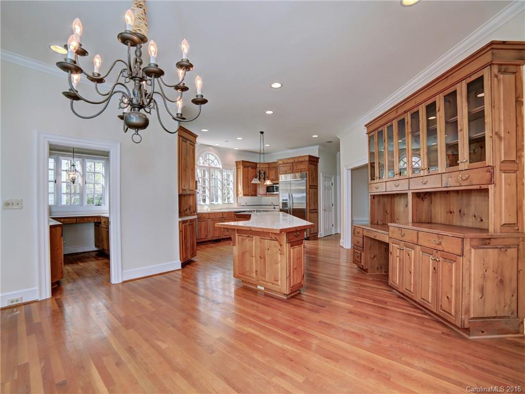 2101 Scotland Ridge Road Charlotte, NC 28211 - Photo 10 of 24 a view of living room with kitchen island furniture and wooden floor