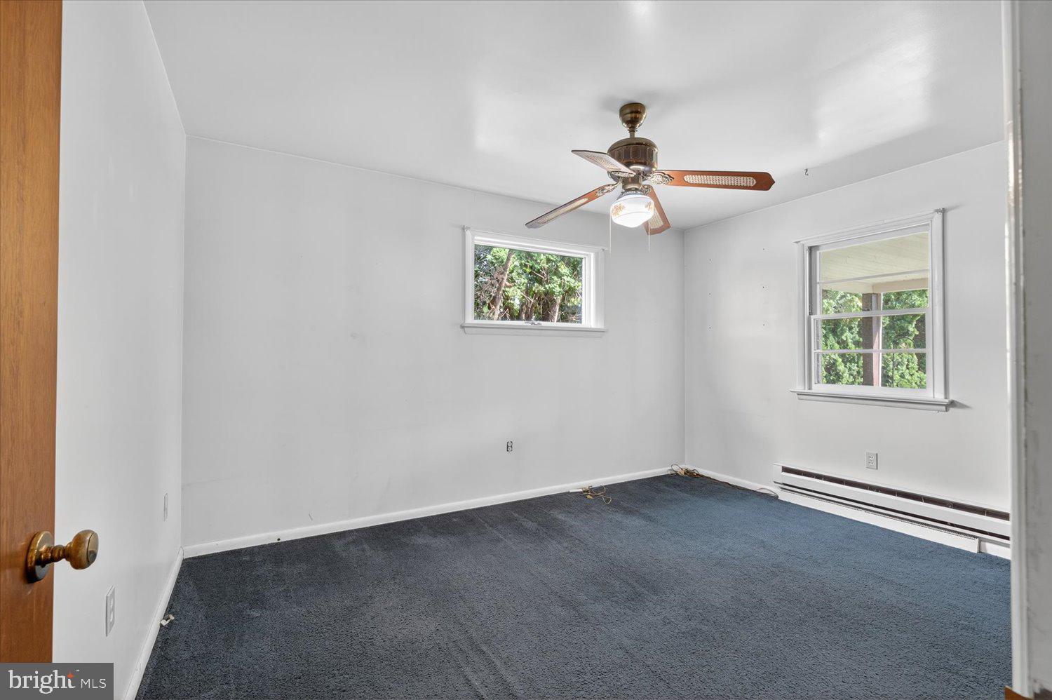 175 Eastbrook Road Smoketown, PA 17576 - Photo 14 of 24 an empty room with windows and fan
