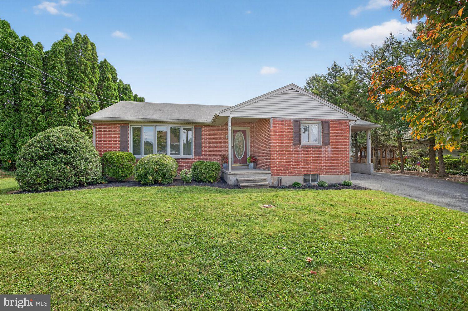 175 Eastbrook Road Smoketown, PA 17576 - Photo 2 of 24 a front view of house with yard and trees