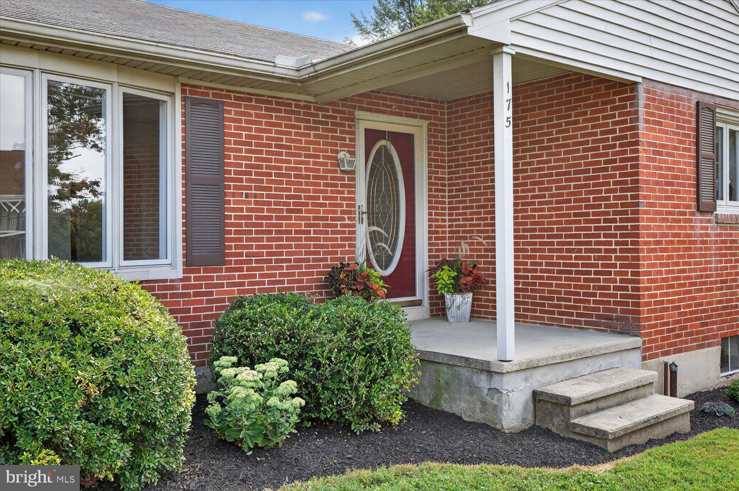175 Eastbrook Road Smoketown, PA 17576 - Photo 3 of 24 a front view of a house with a garden