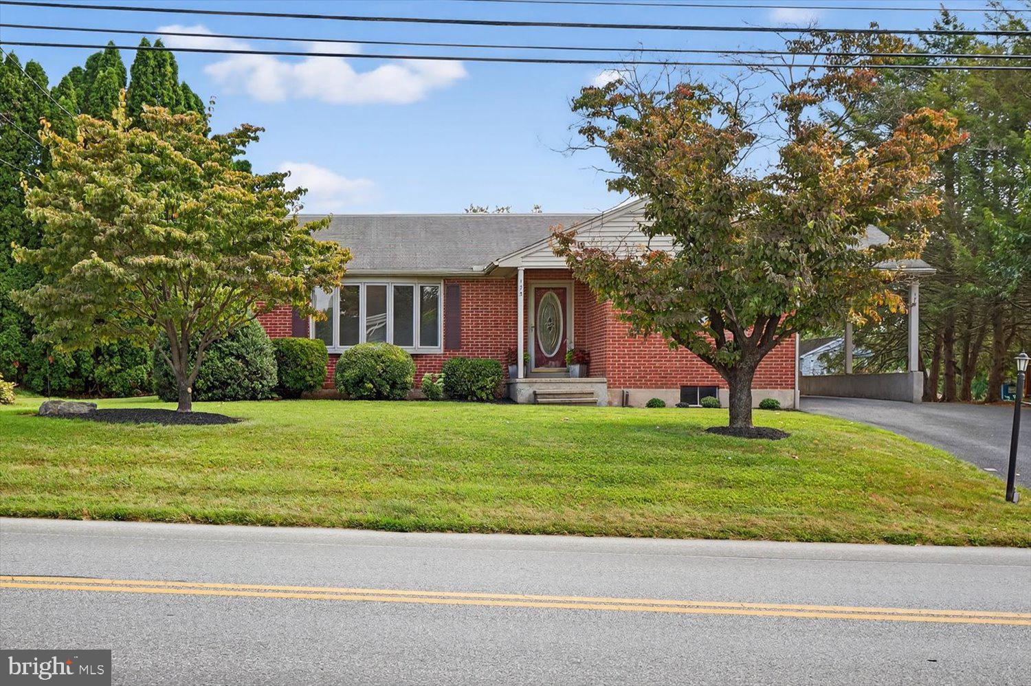 175 Eastbrook Road Smoketown, PA 17576 - Photo 4 of 24 a house view with a garden space
