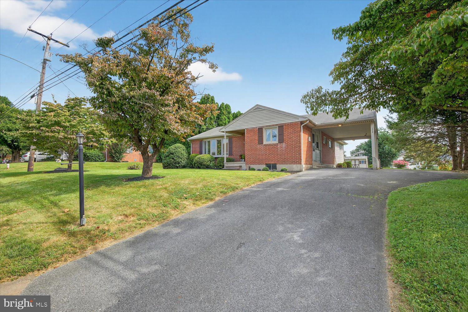 175 Eastbrook Road Smoketown, PA 17576 - Photo 5 of 24 a front view of house with yard and tree in it