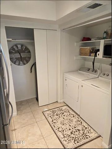 a view of bathroom with a sink and a mirror