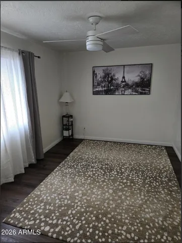 a bathroom with a toilet a sink and shower