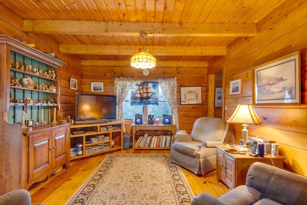 207 West Princeton Road Westminster, MA 01473 - Photo 12 of 36 a living room with fireplace furniture and a flat screen tv