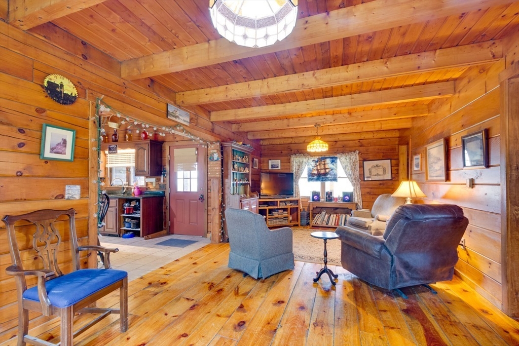 207 West Princeton Road Westminster, MA 01473 - Photo 15 of 36 a living room with furniture and a fireplace