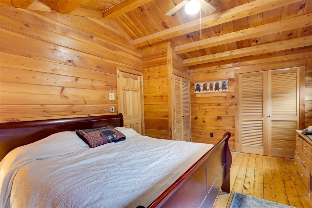 207 West Princeton Road Westminster, MA 01473 - Photo 17 of 36 a bedroom with a bed and wooden floor