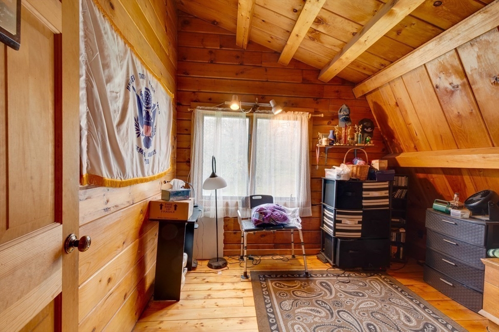 207 West Princeton Road Westminster, MA 01473 - Photo 20 of 36 a storage room with wooden floor and furniture