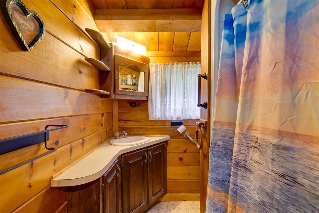 207 West Princeton Road Westminster, MA 01473 - Photo 22 of 36 a bathroom with a sink and a mirror