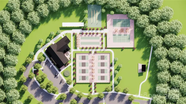 an aerial view of a house with outdoor space swimming pool