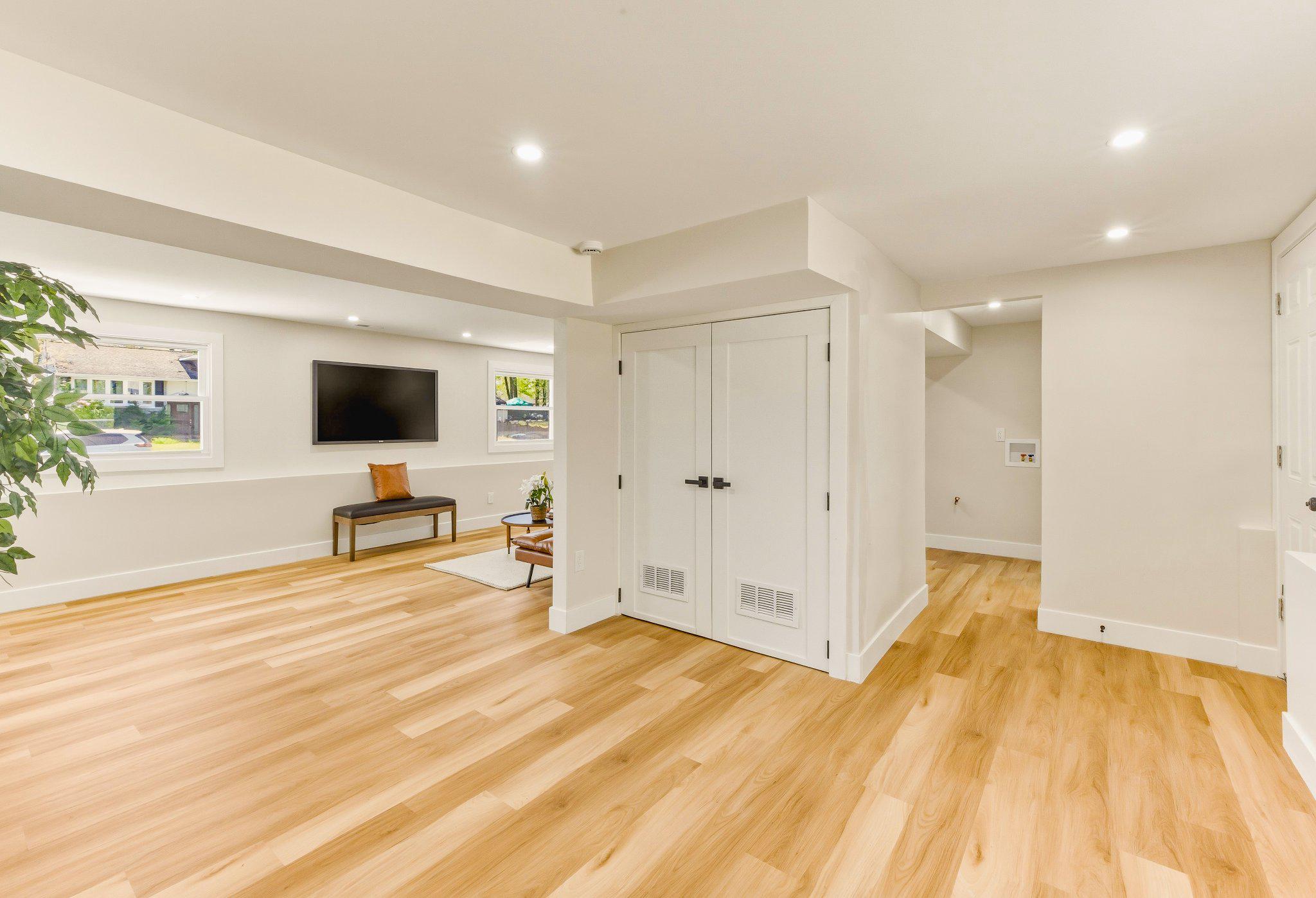 11 Yale Road Atco, NJ 08004 - Photo 7 of 20 a view of a livingroom with wooden floor and a flat screen tv