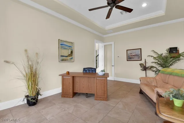a bathroom with a granite countertop sink a toilet and a large mirror