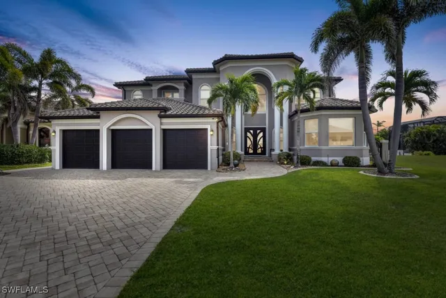 a view of living room with furniture and a potted plant