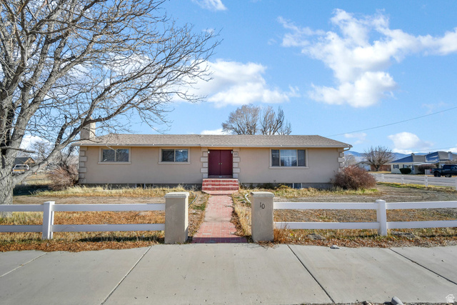 10 North Main Street Centerfield, UT 84622 - Photo 2 of 52 View of front facade featuring a fenced front yard