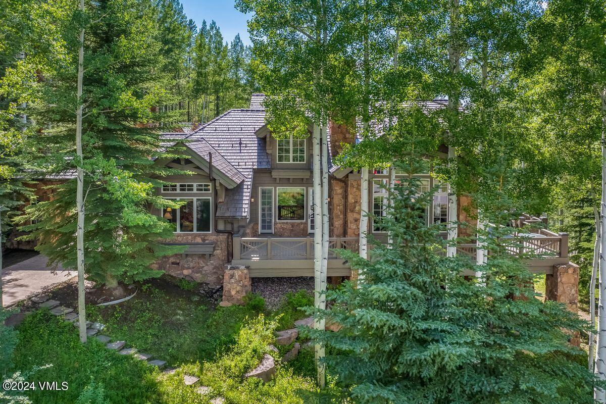 front view of a house with a garden