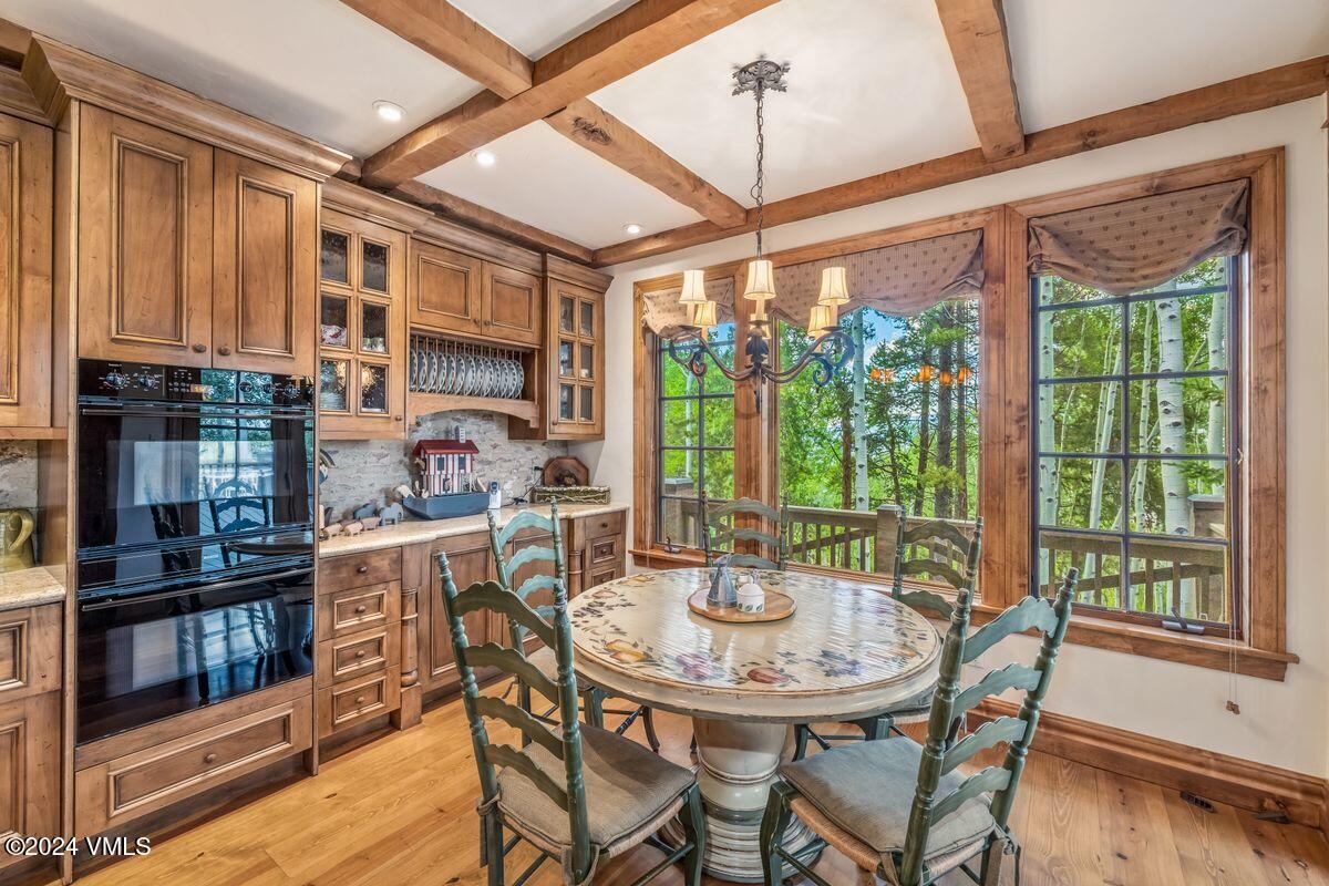 2286 Daybreak Ridge Road Avon, CO 81620 - Photo 11 of 33 a view of a dining room with furniture window and outside view