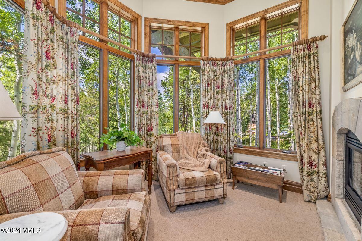 2286 Daybreak Ridge Road Avon, CO 81620 - Photo 13 of 33 a living room with furniture and a large window