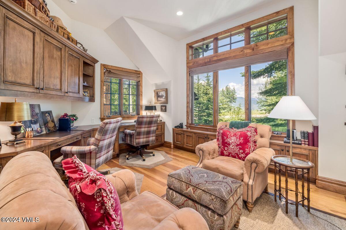 2286 Daybreak Ridge Road Avon, CO 81620 - Photo 16 of 33 a living room with furniture and a large window