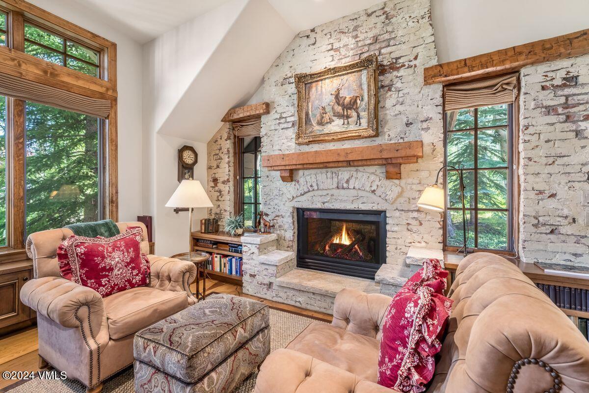 2286 Daybreak Ridge Road Avon, CO 81620 - Photo 17 of 33 a living room with furniture and a fireplace