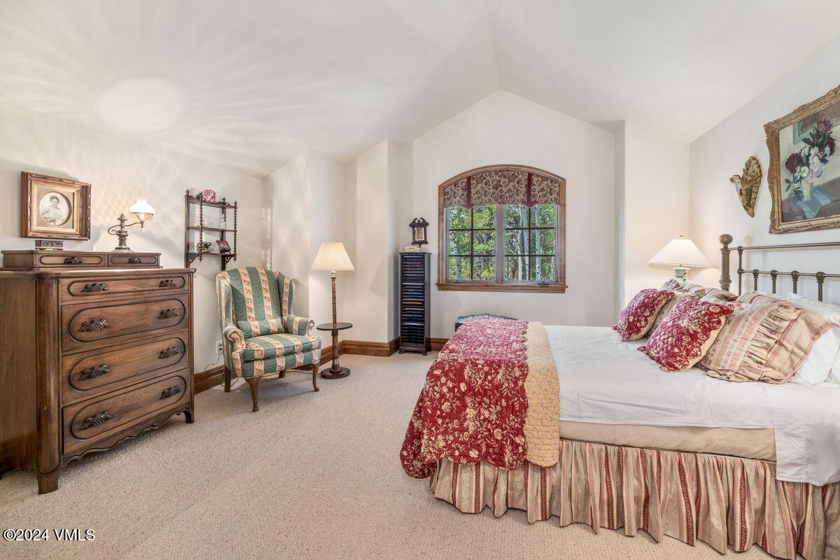 2286 Daybreak Ridge Road Avon, CO 81620 - Photo 20 of 33 a bedroom with a bed and a window