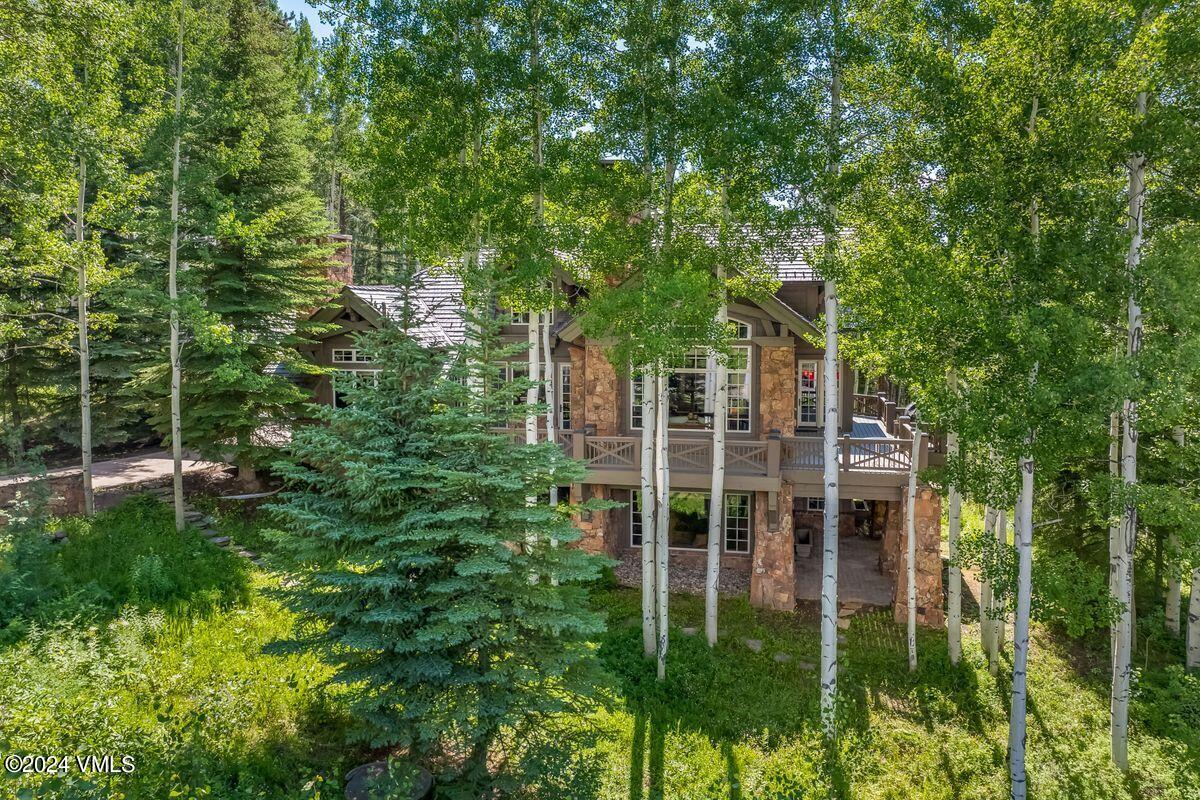 2286 Daybreak Ridge Road Avon, CO 81620 - Photo 30 of 33 a view of a backyard with plants