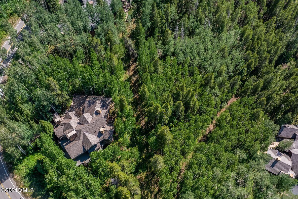 2286 Daybreak Ridge Road Avon, CO 81620 - Photo 32 of 33 an aerial view of a house with outdoor space and street view