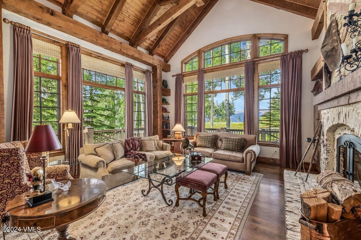 2286 Daybreak Ridge Road Avon, CO 81620 - Photo 5 of 33 a living room with furniture and a large window