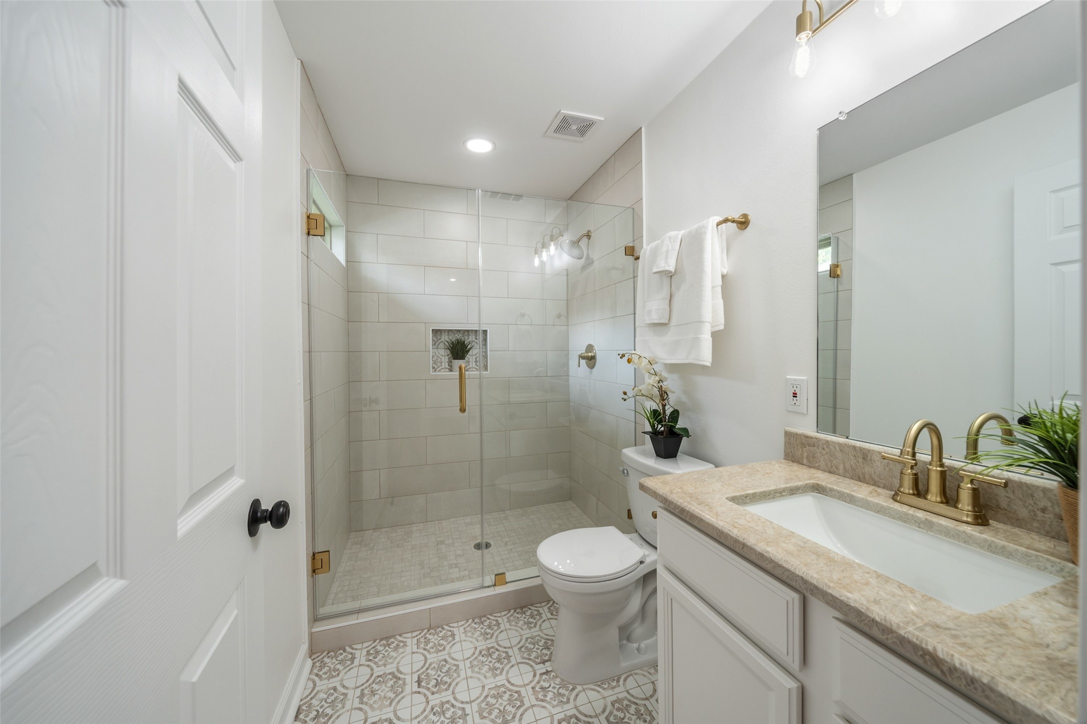 3051 Rothermel Road Houston, TX 77093 - Photo 14 of 24 Primary bathroom with designer finishes and large, standing shower.