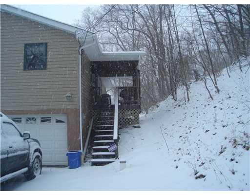 281 State Road Valencia, PA 16059 - Photo 13 of 13 Exterior Back. WOODS, PRIVATE SETTING.DECK OFF OF KITCHEN.