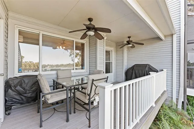 a view of a house with a yard porch and sitting area