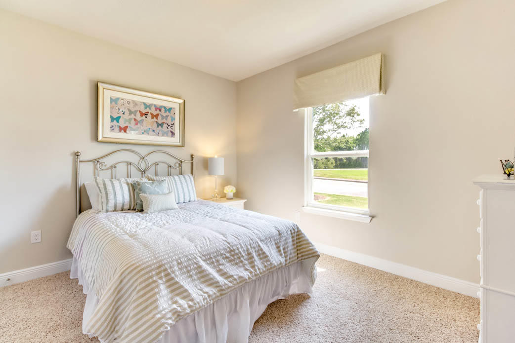 190 Conner Circle Santa Rosa Beach, FL 32459 - Photo 19 of 38 a bedroom with a bed and a window
