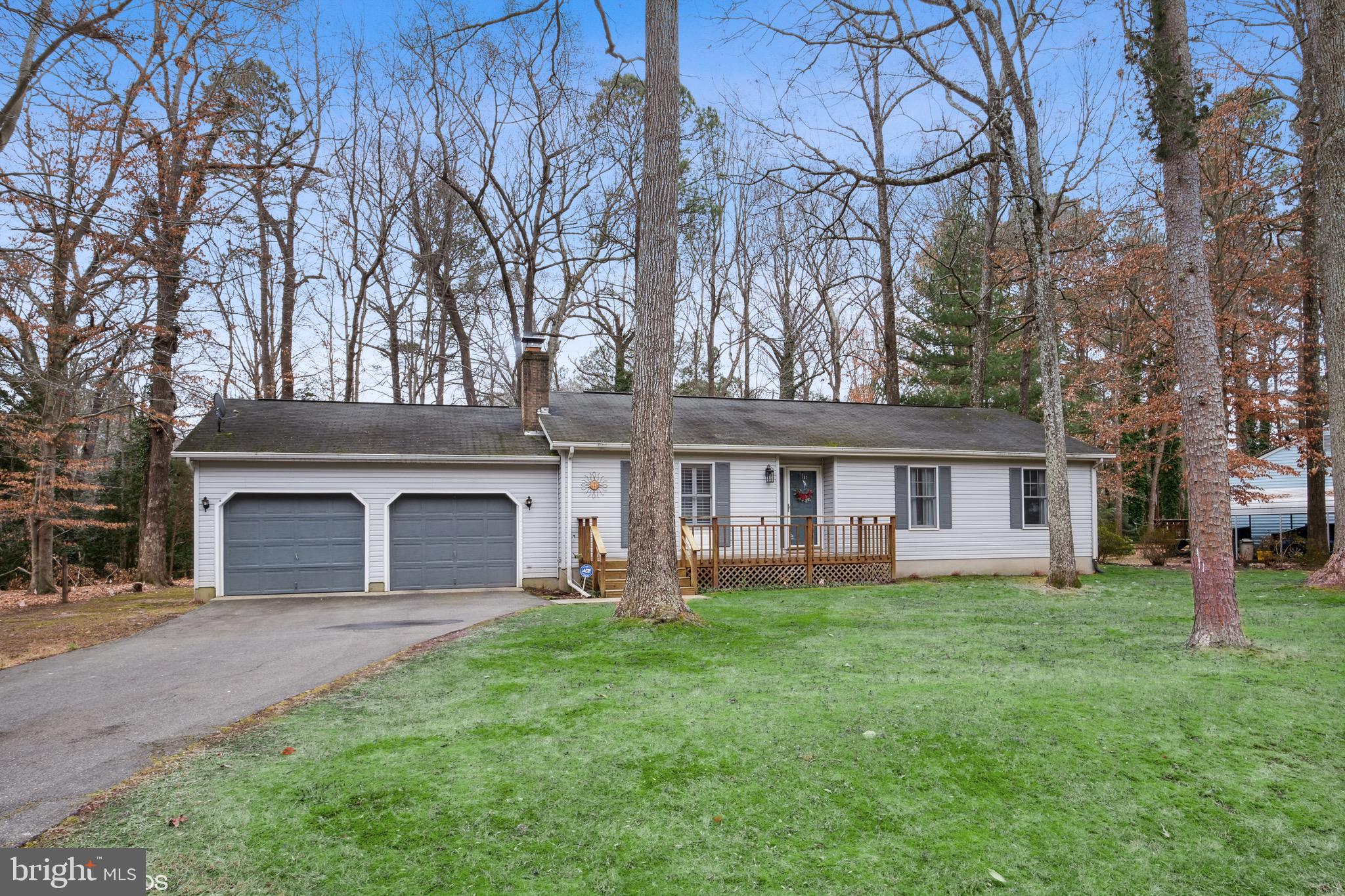 12934 Parran Drive Lusby, MD 20657 - Photo 20 of 21 front view of a house with a yard