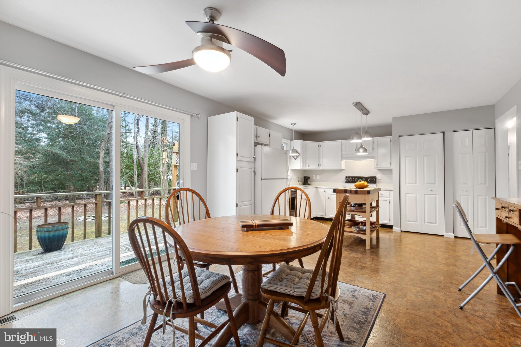 12934 Parran Drive Lusby, MD 20657 - Photo 3 of 21 a view of a dining room with furniture window and outside view