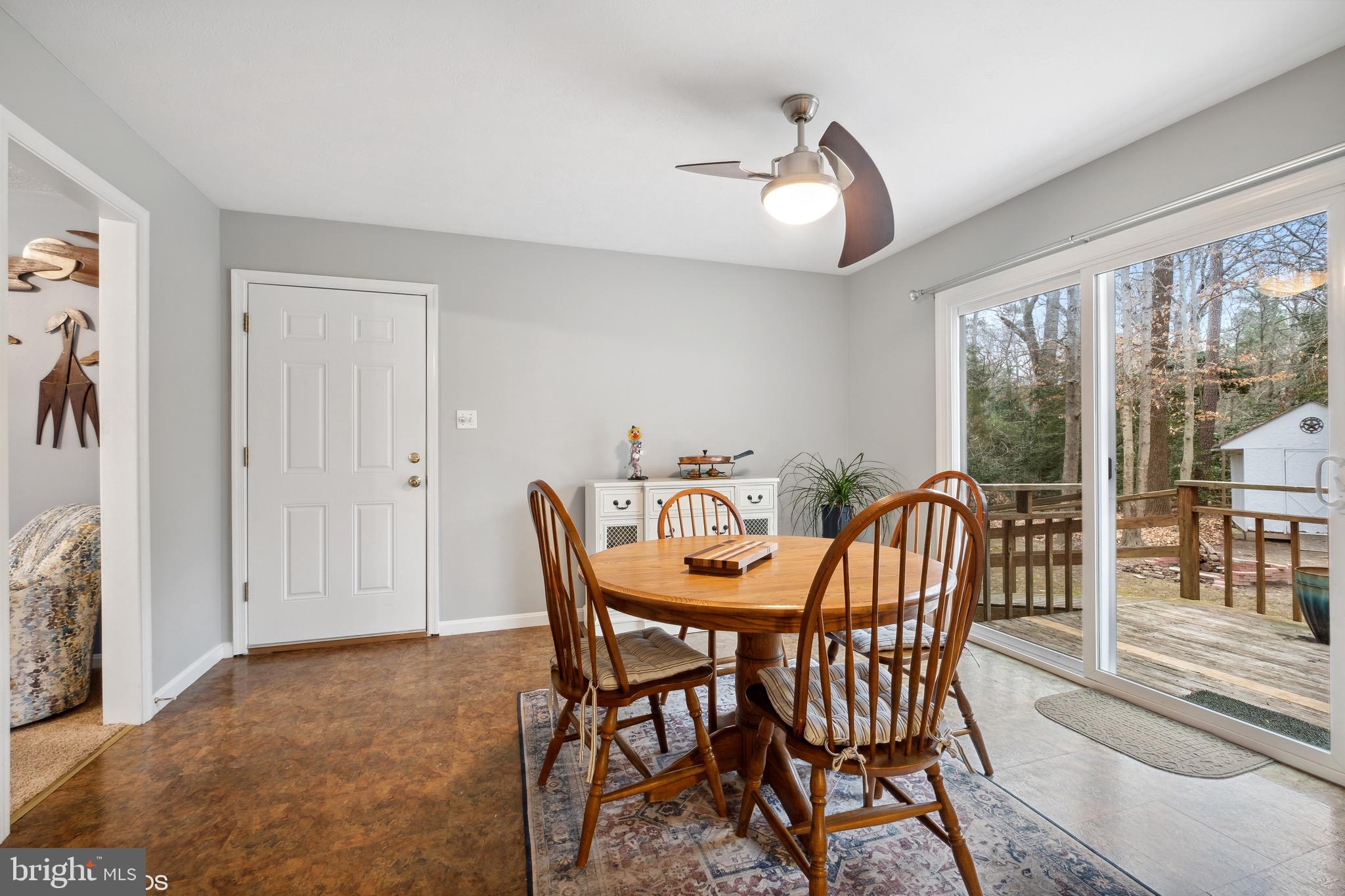 12934 Parran Drive Lusby, MD 20657 - Photo 4 of 21 a view of a dining room with furniture window and outside view