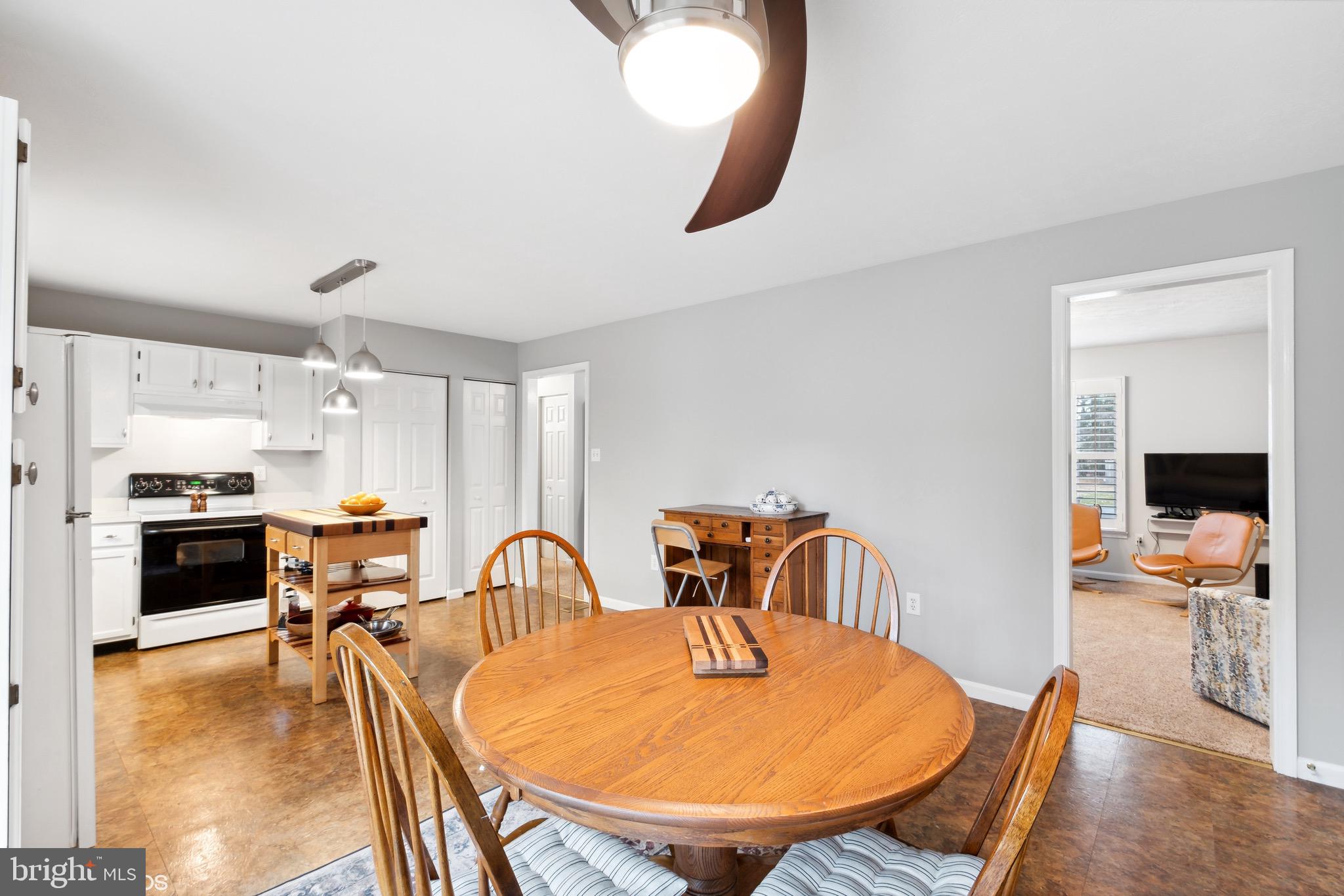 12934 Parran Drive Lusby, MD 20657 - Photo 5 of 21 a view of a dining room with furniture and a kitchen view