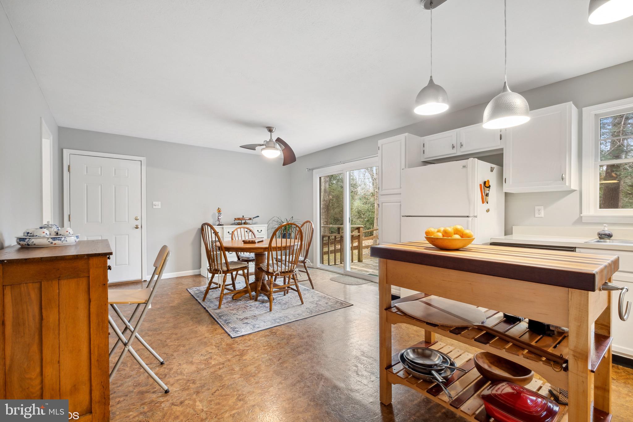 12934 Parran Drive Lusby, MD 20657 - Photo 6 of 21 a view of a dining room with furniture window and outside view