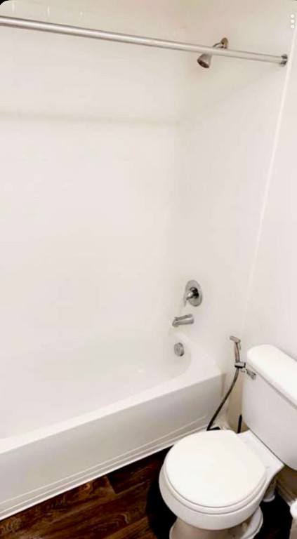 13120 Roving Pass Elgin, TX 78621 - Photo 15 of 21 a white toilet and shower curtain