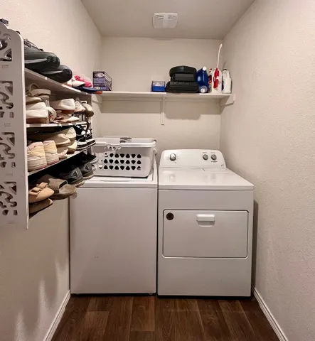 a utility room with dryer and washer
