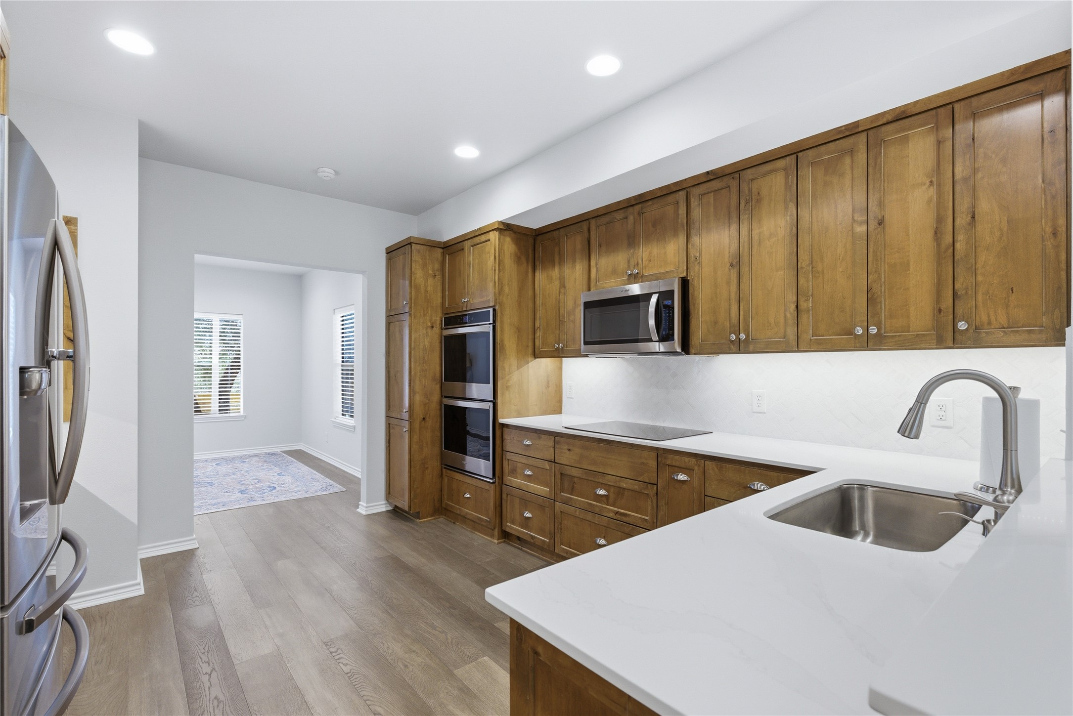 1204 Orlando Road Austin, TX 78733 - Photo 7 of 40 Culinary delights await in this modern kitchen with extensive cabinetry and premium finishes.