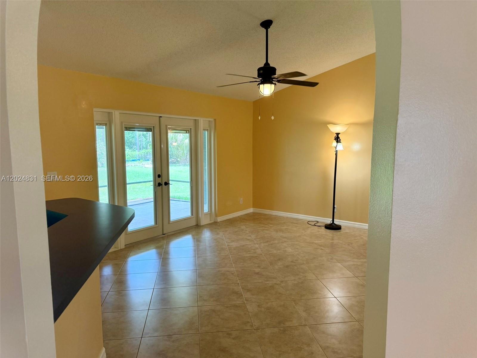 15819 76th Road North Loxahatchee, FL 33470 - Photo 12 of 45 a view of an empty room with a window