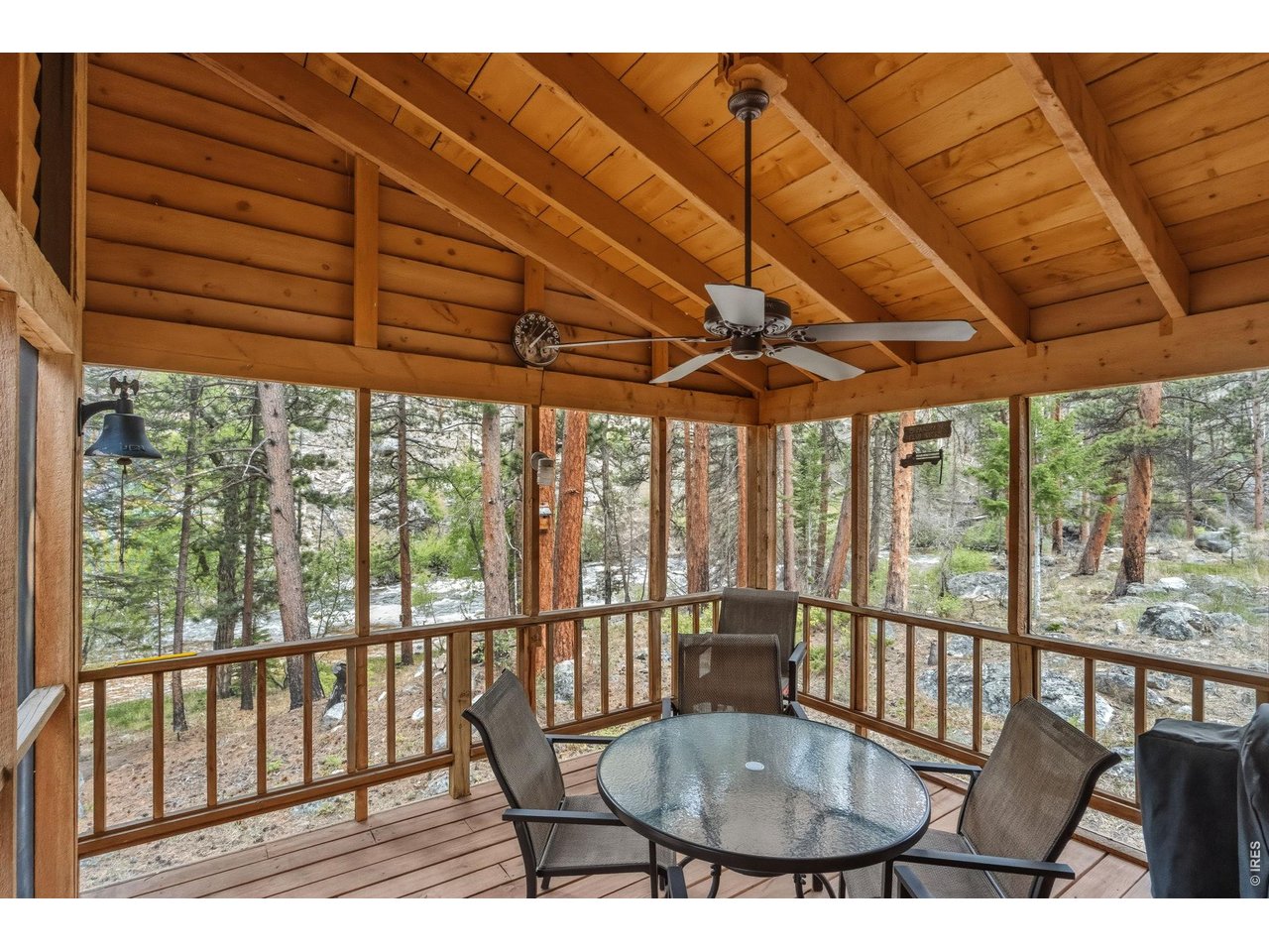 36917 Poudre Canyon Road Bellvue, CO 80512 - Photo 10 of 46 Screened porch is the perfect connection between indoor and outdoor living
