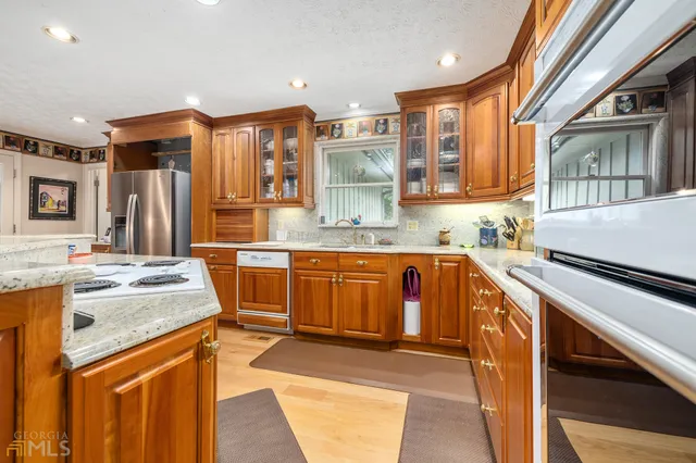 a spacious bedroom with a bed and a couch