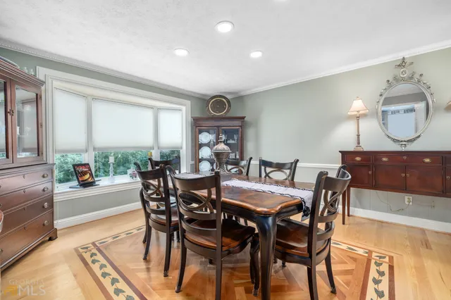 a bathroom with a shower and a glass door