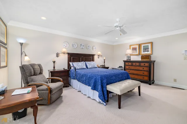 a bathroom with a granite countertop sink a vanity and shower