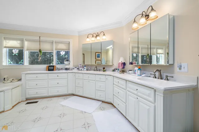 a bedroom with furniture and a book shelf