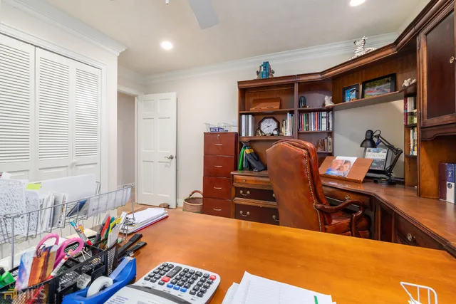 a view of a livingroom with couch and a large window