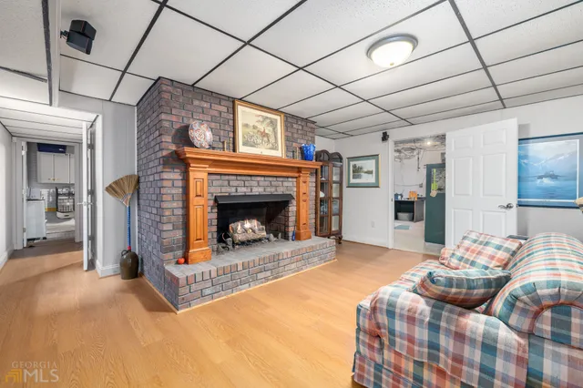 a front view of a house with a garden and plants